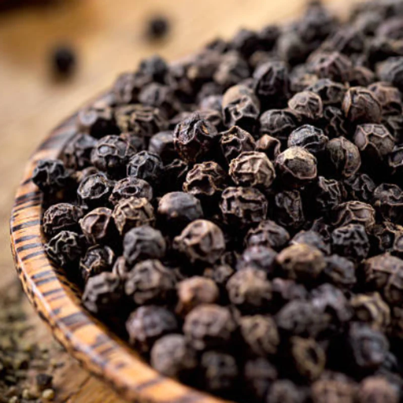 Huile essentielle de Poivre Noir — Stimulation et Vitalité